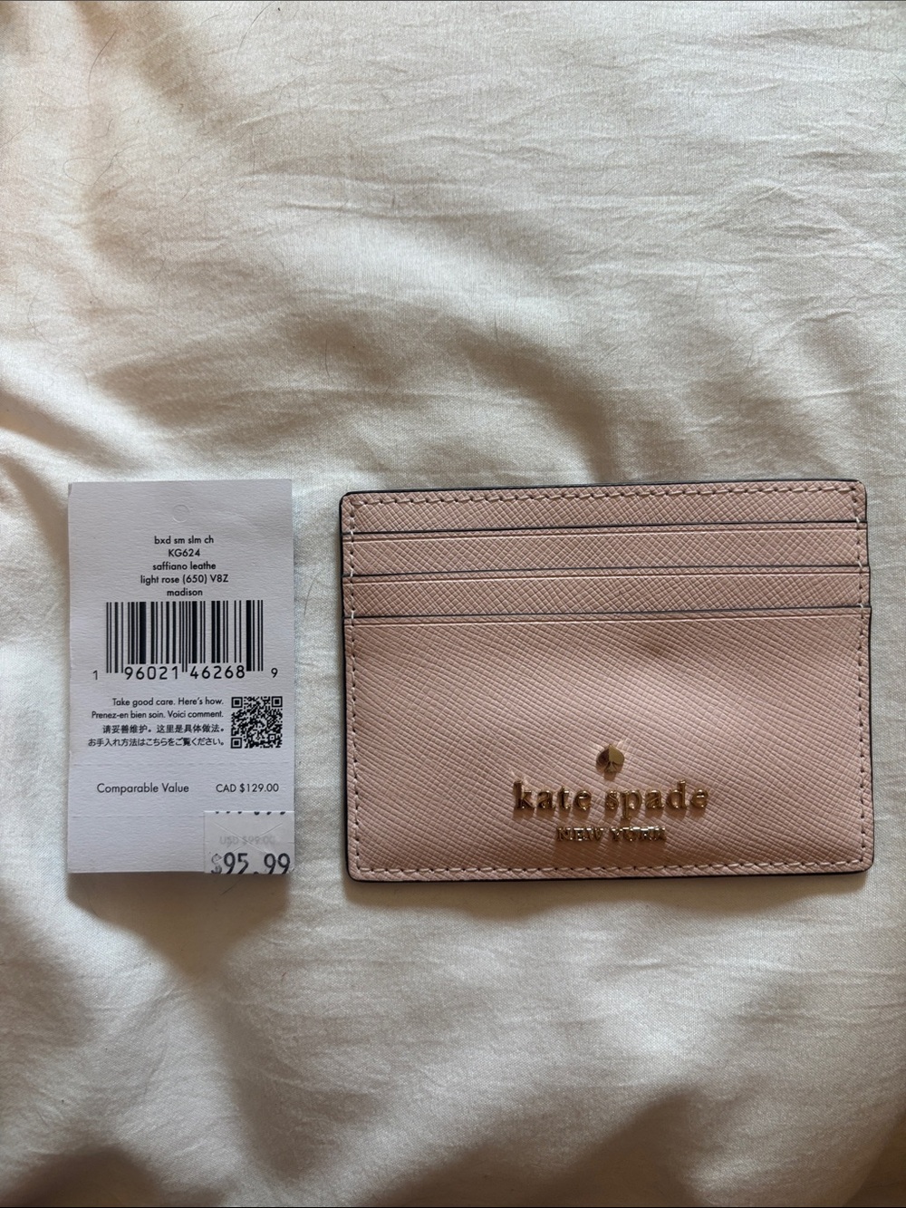 kate spade light rose cardholder with gold logo